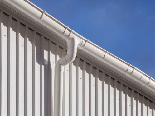 Rain gutter on a building on a hot Alabama day